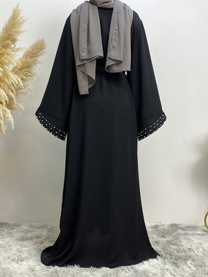 Back view of elegant Maheen abaya with belt