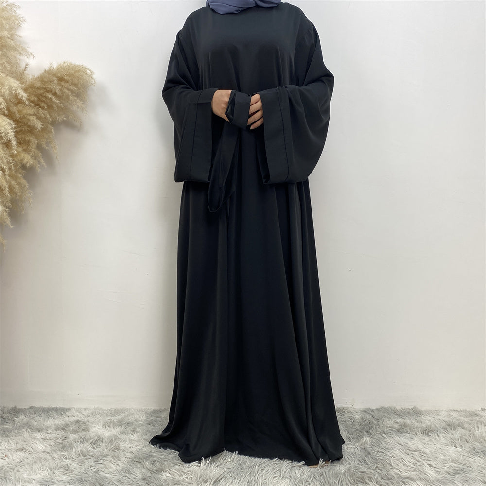 Hira abaya in nidha fabric with loose fit and matching belt
