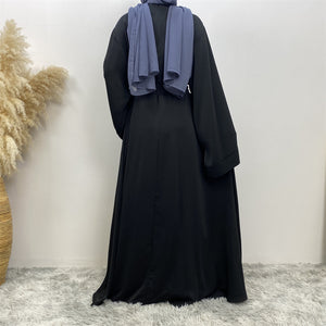 Back view of Hira abaya in nidha fabric showing modest flow