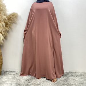 Front view of Hira abaya with elegant flow and pleated belt styling