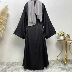 Back view of Hira satin abaya showing satin sheen and graceful drape