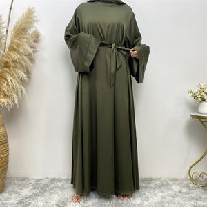 Side view of Hira satin abaya showing satin sheen and graceful drape