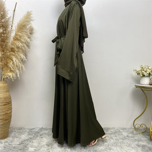 Side view of Hira satin abaya showing satin sheen and graceful drape