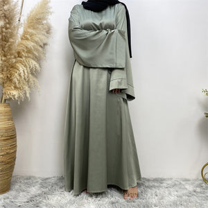 Front view of Hira satin abaya in soft satin fabric with elegant flow