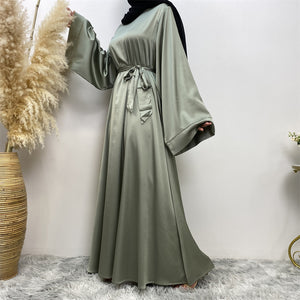 Side view of Hira satin abaya showing satin sheen and graceful drape