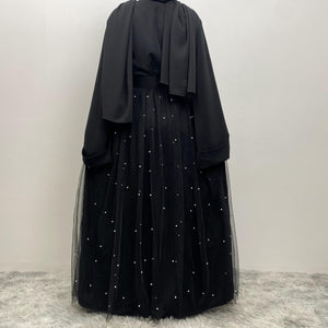 Back view of Laila pearl abaya with flowing skirt design