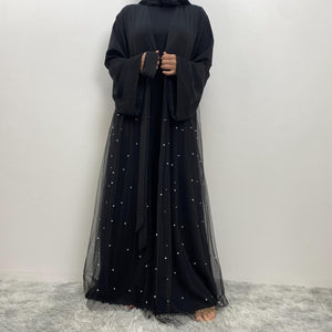 Occasion abaya with pearl net overlay and nidha bodice