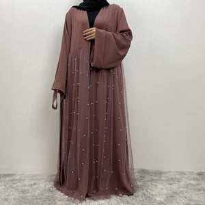 legant pearl abaya styled with belt for modest wear