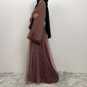 Luxury pearl abaya with full flare skirt and wide sleeves