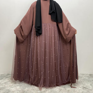 Back view of Laila pearl abaya with flowing skirt design