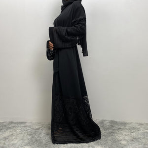 Side view of Arya open abaya showing modest flow, lace detail, and practical pockets