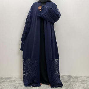 Navy blue Arya open abaya with embroidered lace trim on hem and sleeves, made from luxury nidha fabric