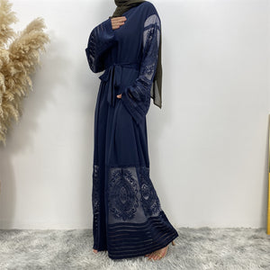 Close-up of sheer embroidered lace trim on sleeve of Arya open abaya