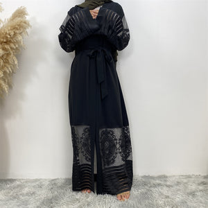 Front view of Arya open abaya in nidha fabric with sheer lace trim and matching belt