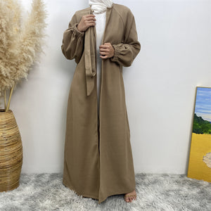 Modest winter abaya coat with full coverage and side pockets