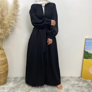 Modest winter abaya coat with full coverage and side pockets