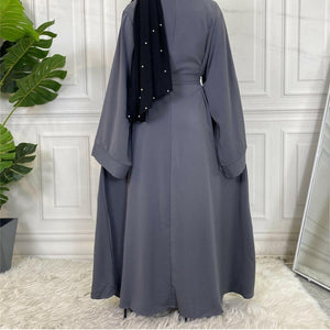 Back view of Hira abaya in nidha fabric showing modest flow