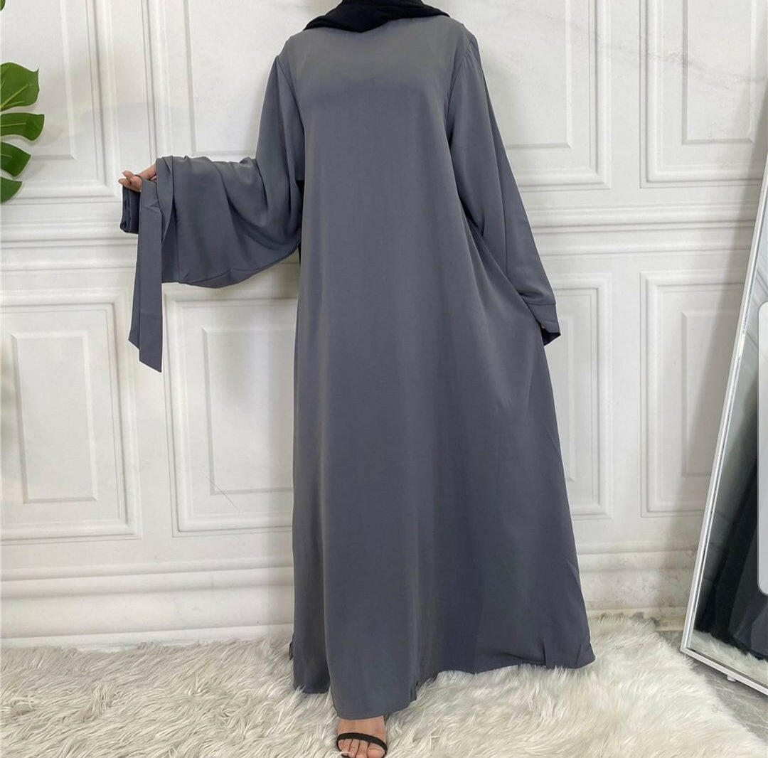 Hira abaya in nidha fabric with loose fit and matching belt