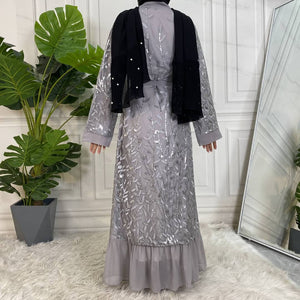 Back view of Kinza Abaya showcasing flowing fabric and elegant silhouette