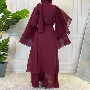 Back view of layered chiffon open abaya with belt