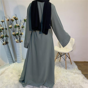 Back view of elegant Maheen abaya with belt
