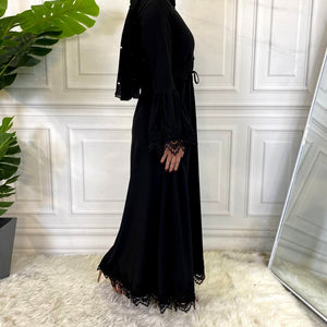 Side view of pleated waist lace trim abaya