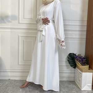 Modest fashion white Aira abaya with nursing zip, lace trim sleeves, and high-quality nidha fabric.
