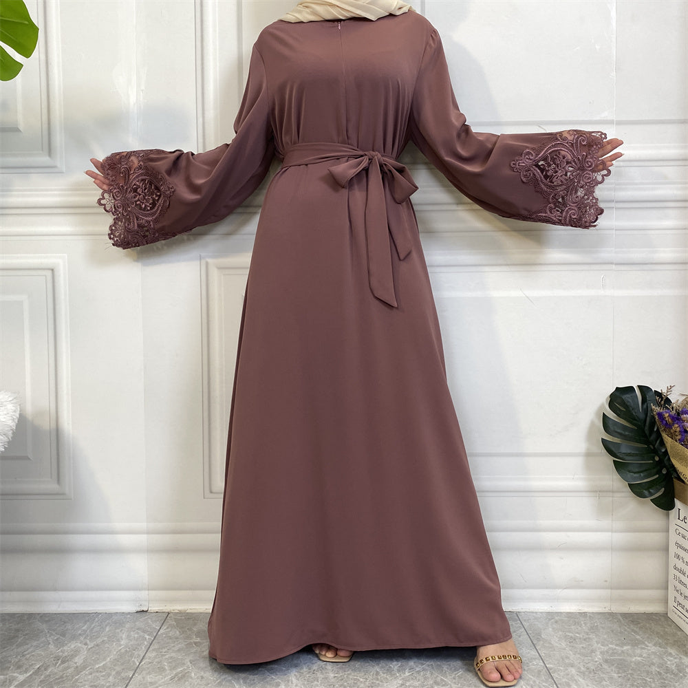 Elegant nursing-friendly abaya in Mauve with invisible zip, lace trim sleeves, and invisible side pockets.
