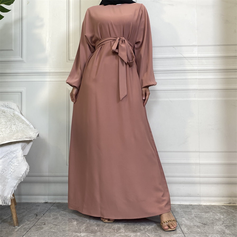 Dina abaya in nidha fabric with loose fit, matching belt and modest flow