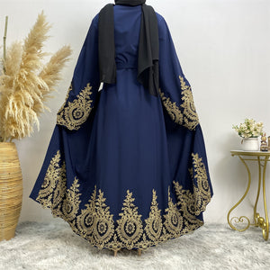Back view of elegant gold lace border abaya