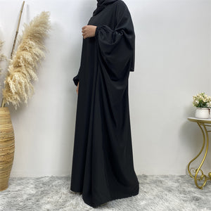 Side view of Fiza Farasha abaya in nidha fabric showing modest flow