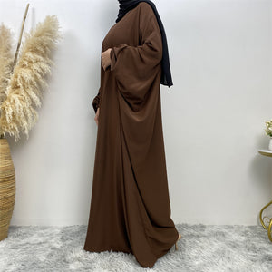 Side view of Fiza Farasha abaya in nidha fabric showing modest flow