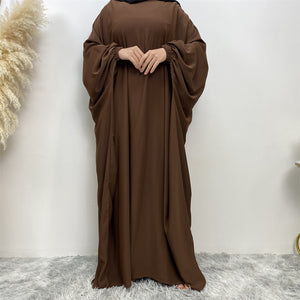 Front view of Fiza Farasha abaya with flowing design and elasticated sleeves