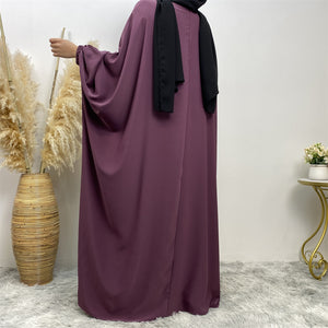 Side view of Fiza Farasha abaya in nidha fabric showing modest flow