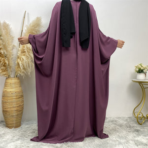 Back view of Fiza Farasha abaya in nidha fabric showing modest flow