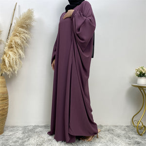Front view of Fiza Farasha abaya with flowing design and elasticated sleeves