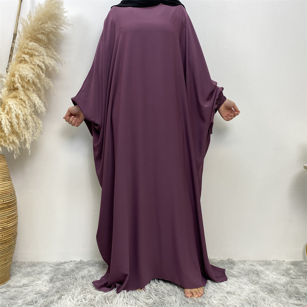 Front view of Fiza Farasha abaya with flowing design and elasticated sleeves