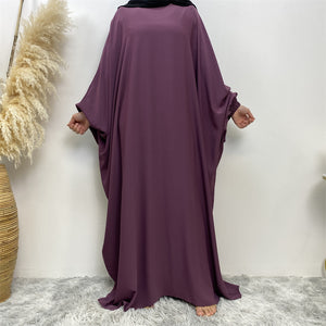 Front view of Fiza Farasha abaya with flowing design and elasticated sleeves