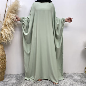 Front view of Fiza Farasha abaya with flowing design and elasticated sleeves