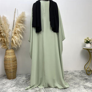 Fiza Farasha abaya paired with khimar for modest everyday wear, prayer, or Umrah