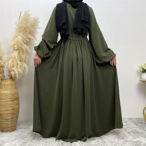 Back view of black umbrella cut abaya with full flare