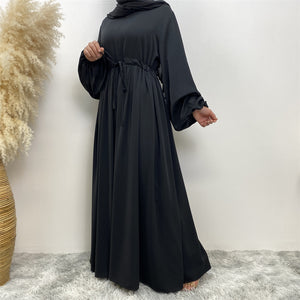 Wudu-friendly abaya with elasticated sleeves for Umrah