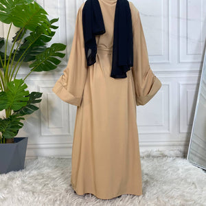 Dua open abaya layered with abaya slip dress for modest fashion look