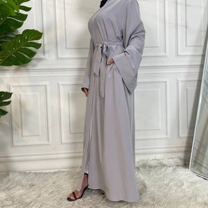 Side view of Dua open abaya in soft polyester fabric with modest flow