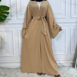 Front view of Dua open abaya with pockets, wide sleeves and graceful flow