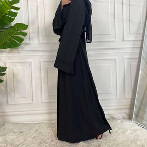 Side view of Dua open abaya in soft polyester fabric with modest flow