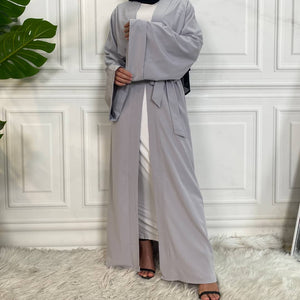 Dua open abaya in soft polyester with flowy design and matching belt