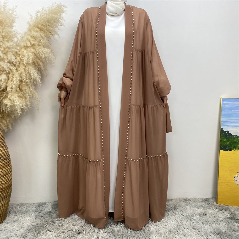 Front view of Gazala abaya with pearls, layered chiffon and matching belt