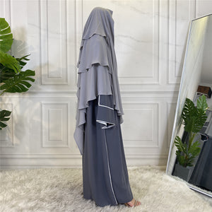 Side view of 3 layer khimar with flowing chiffon layers