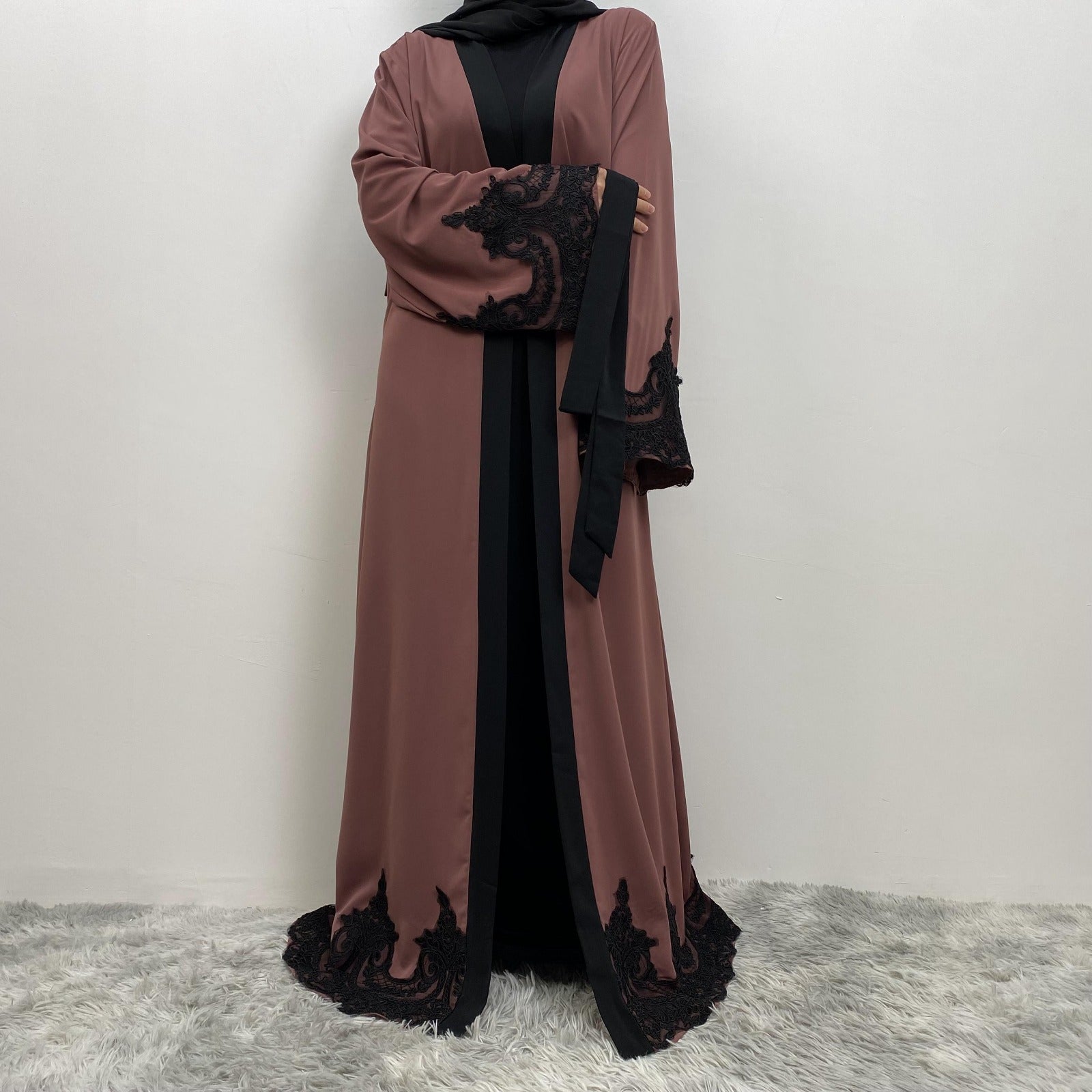 Modest black trim abaya with luxury flow and side pockets